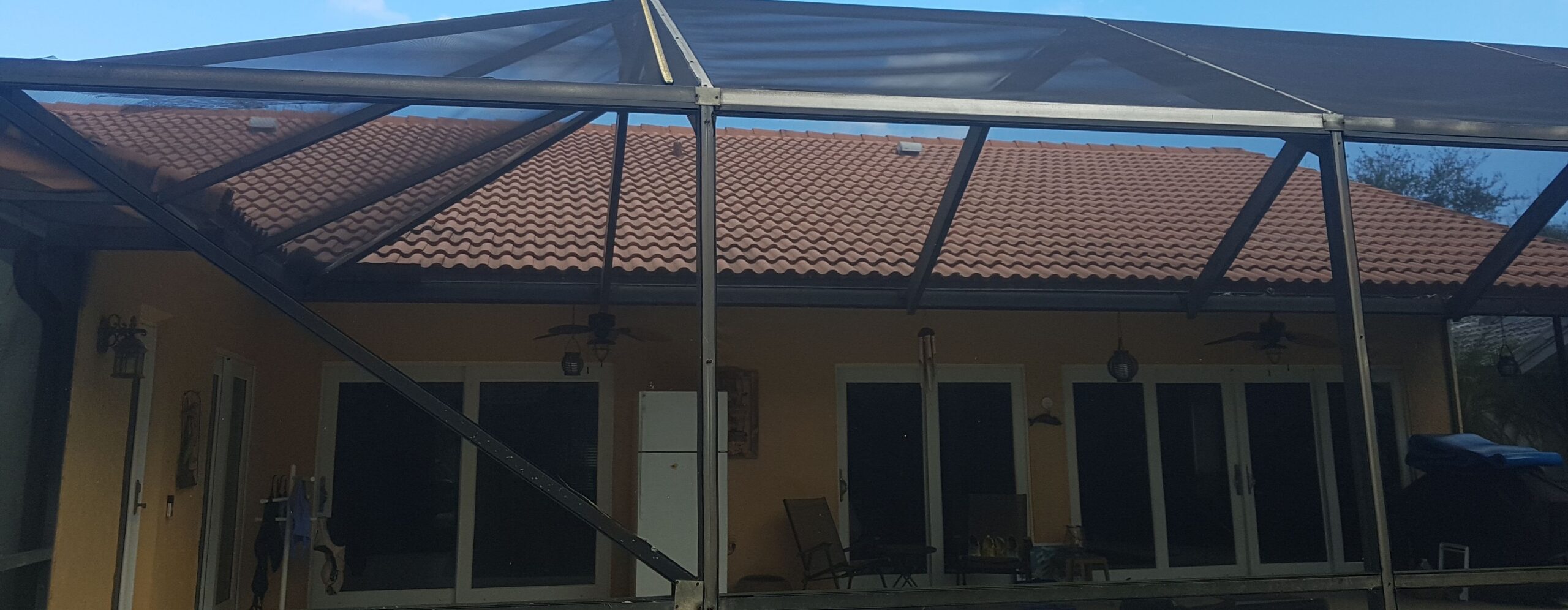 Bronze screen enclosure over a Florida home