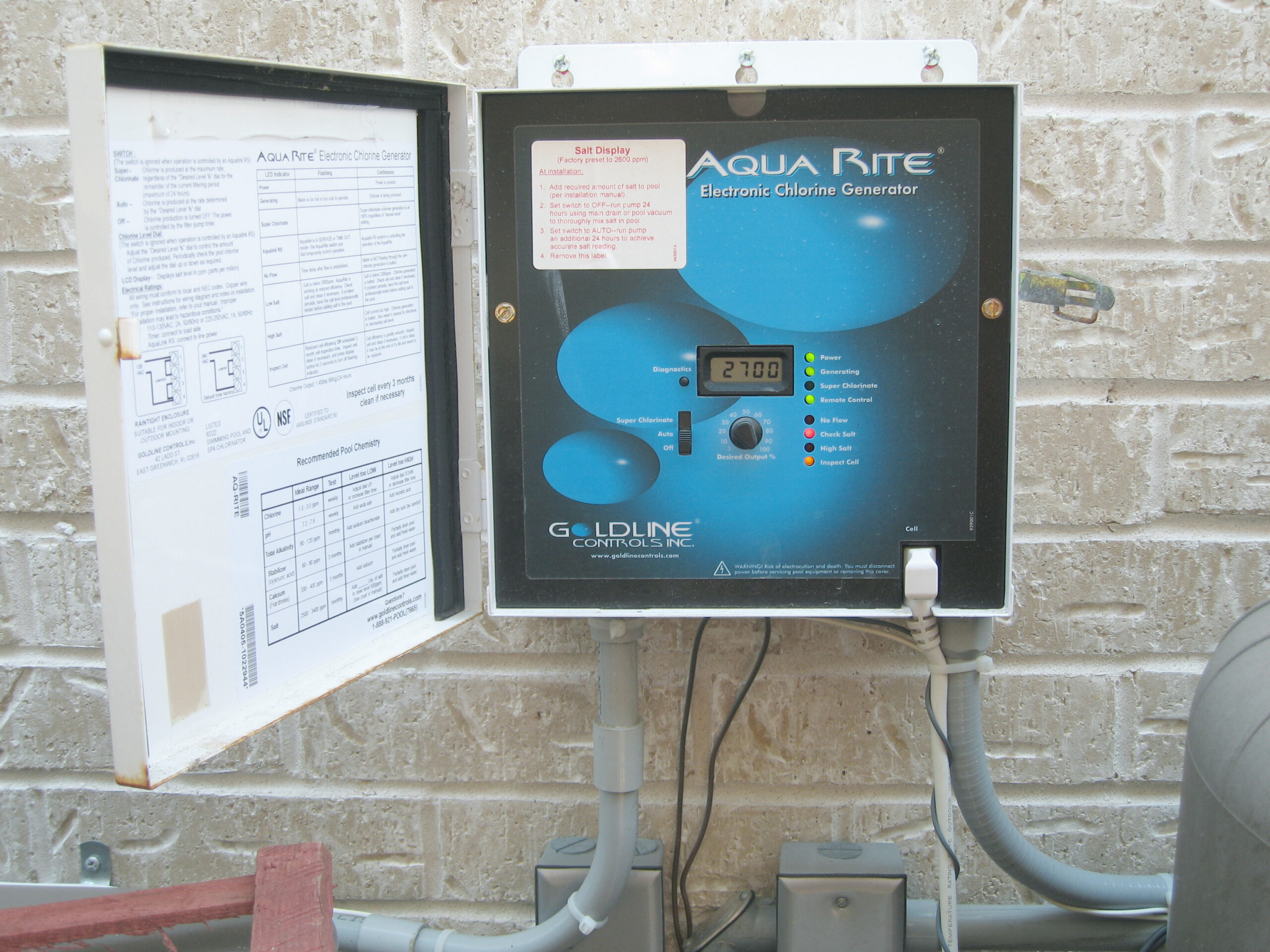 Salt chlorine generator control box on a wall